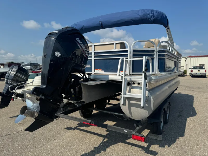 Slide: The Image of 2021 Sun Tracker Party Barge 20 DLX pontoon boat with Mercury outboard motor. - 4