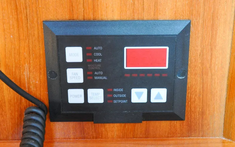 Slide: The Image of Hunter 45CC - Coralee - Navigation Station - AC Controls - 105