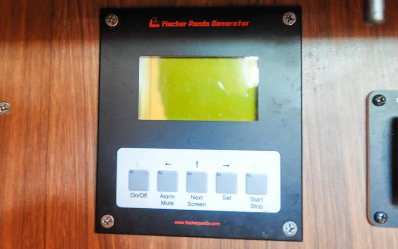 Slide: The Image of Hunter 45CC - Coralee - Navigation Station - Generator Panel - 106