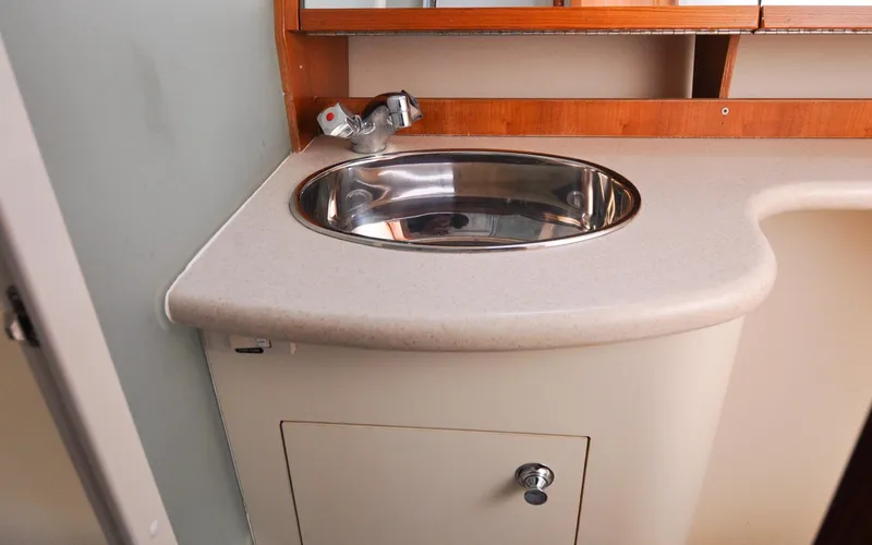 Slide: The Image of Hunter 45CC - Coralee - Aft Cabin - Ensuite Head - Sink - 121