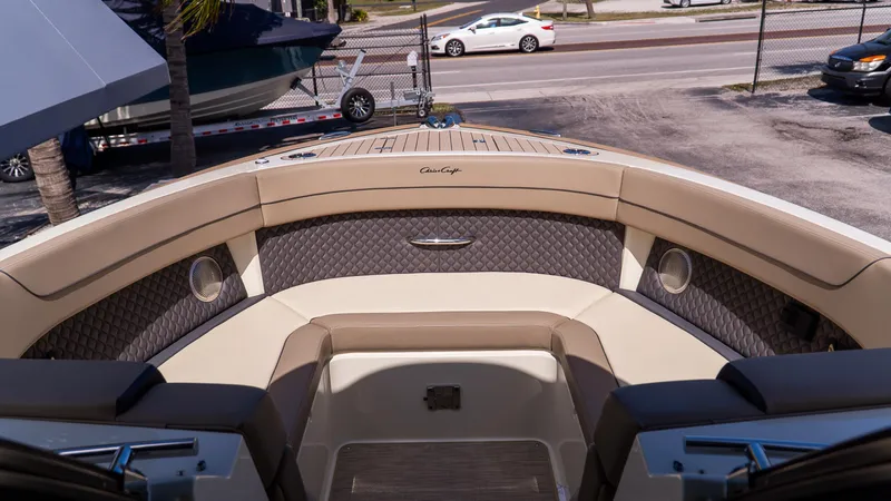 Slide: The Image of 2025 Chris-Craft 32 Calypso boat interior with luxurious seating and elegant design. - 47