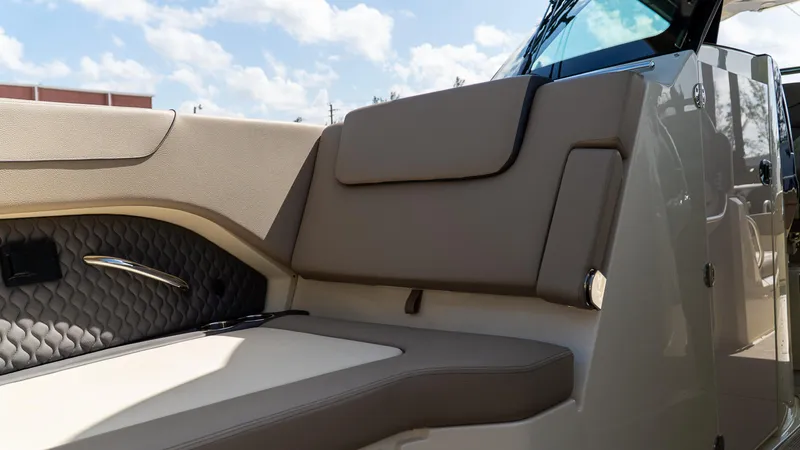 Slide: The Image of 2025 Chris-Craft 32 Calypso boat interior with luxurious seating and elegant design. - 48