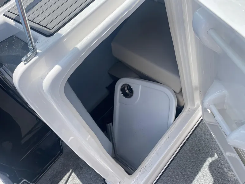Slide: The Image of Storage compartment of a 2018 Yamaha Boats AR240. - 4