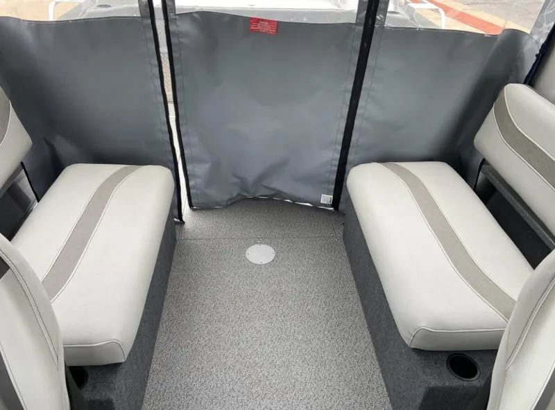 Slide: The Image of Interior seating of 2024 Spartan 200 Astoria boat with gray upholstery. - 8