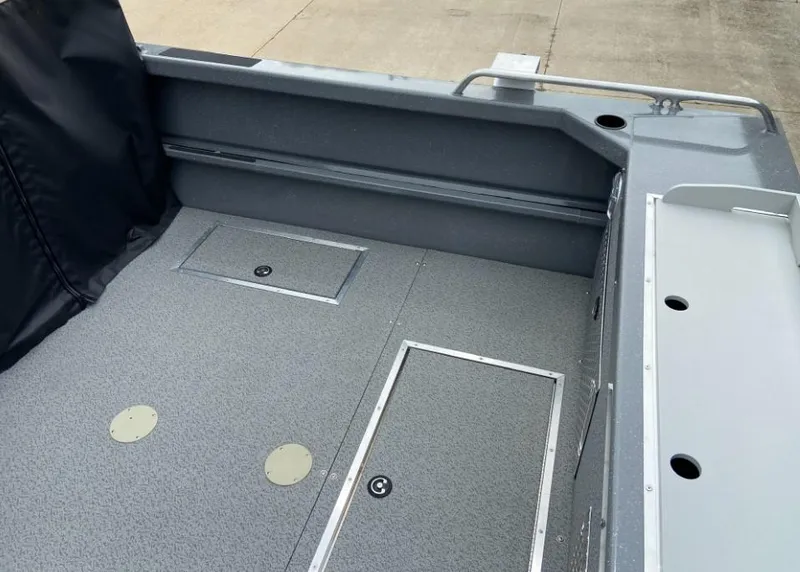 Slide: The Image of 2023 Spartan 215 Athens boat interior with storage compartments. - 9