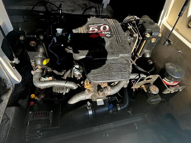Slide: The Image of 2007 Sea Ray 220 Sundeck engine compartment with MerCruiser 5.0 MPI engine. - 14