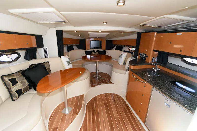 Slide: The Image of Luxurious interior of a 2010 Chaparral Signature 350 yacht with modern amenities. - 16