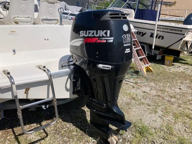 Slide: The Image of 1999 Wellcraft 190 CC F boat with Suzuki 115 Four Stroke outboard motor. - 5