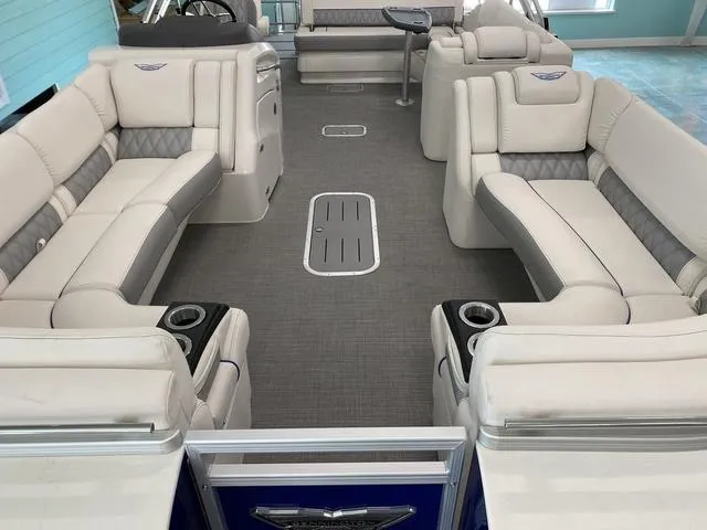 Slide: The Image of 2024 Bennington 25 QSB X1 pontoon boat interior with spacious seating and modern design. - 20