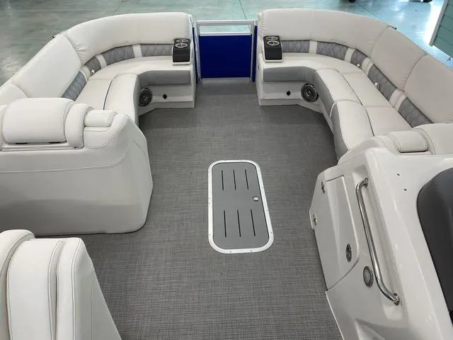Slide: The Image of 2024 Bennington 25 QSB X1 boat interior with plush seating and cup holders. - 21