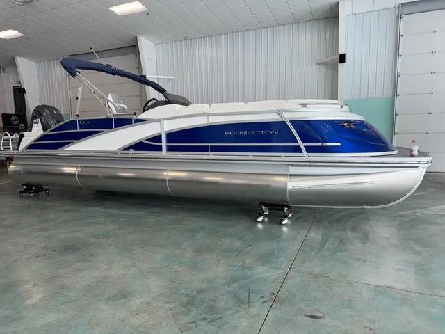Slide: The Image of Bennington 25 QSB X1 2024 boat upholstery with blue stitching detail. - 26