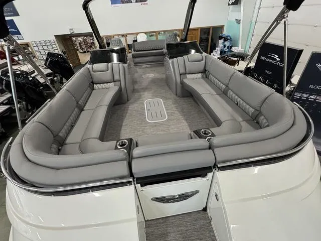 Slide: The Image of 2024 Bennington 28 QXSBWA X1 pontoon boat interior with luxurious seating. - 9