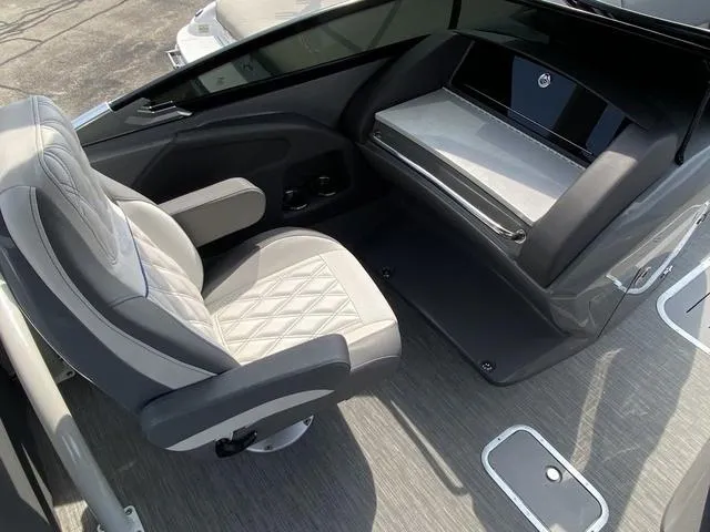 Slide: The Image of Luxurious interior of 2023 Bennington 27 RXFBWA T2 boat with plush seating and sleek design. - 10