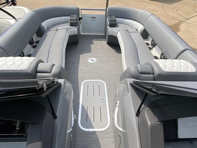 Slide: The Image of 2023 Bennington 27 RXFBWA T2 pontoon boat interior with luxurious gray seating. - 11