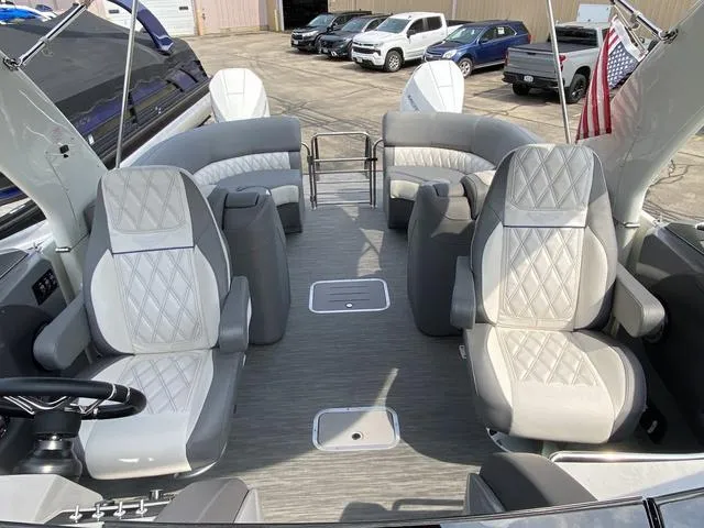 Slide: The Image of Luxurious interior of 2023 Bennington 27 RXFBWA T2 boat with plush seating and modern design. - 15