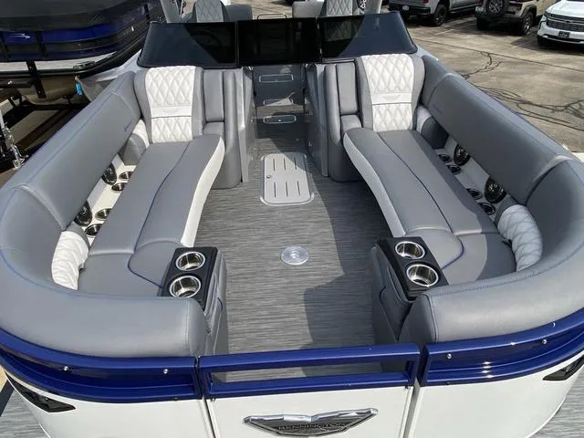 Slide: The Image of 2023 Bennington 27 RXFBWA T2 pontoon boat with luxurious seating and modern design. - 17