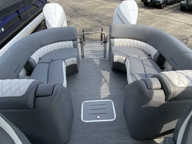 Slide: The Image of 2023 Bennington 27 RXFBWA T2 pontoon boat with luxurious gray seating and spacious deck layout. - 7