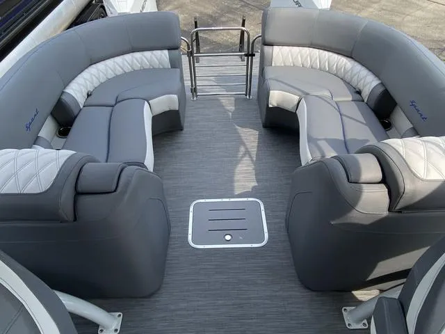 Slide: The Image of 2023 Bennington 27 RXFBWA T2 pontoon boat with luxurious gray seating and spacious deck layout. - 8