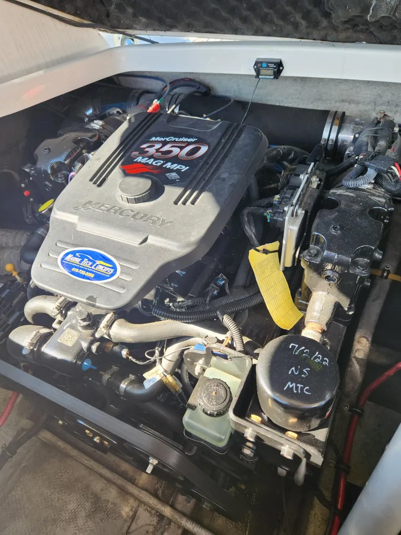 Slide: The Image of 2004 Chris-Craft Launch 28 engine compartment with MerCruiser 350 MAG MPI engine. - 15
