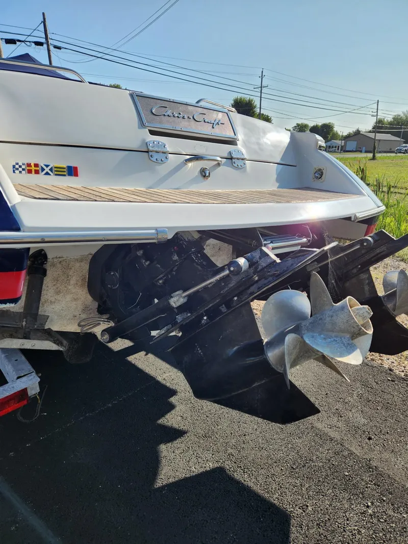 Slide: The Image of 2004 Chris-Craft Launch 28 boat stern with propeller and outdrive. - 9