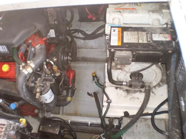 Slide: The Image of Engine compartment of a 2003 Monterey 302 boat showing engine and battery. - 4
