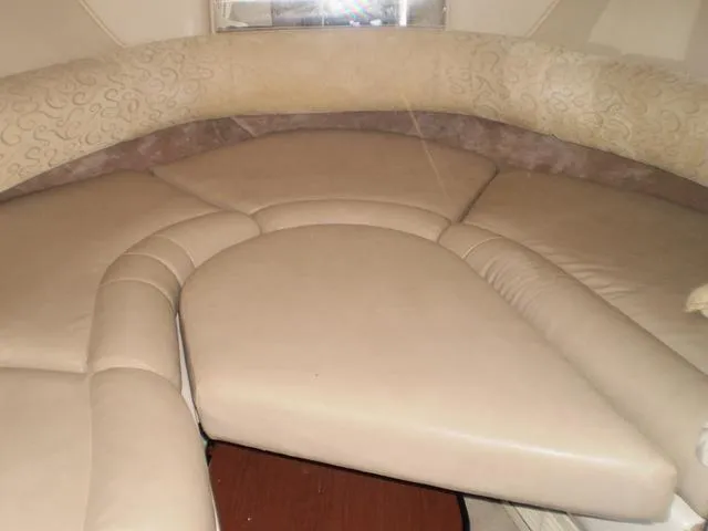 Slide: The Image of Interior seating of 2003 Monterey 302 boat with beige upholstery. - 6