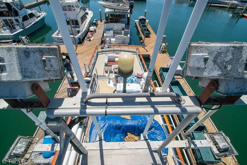 Slide: The Image of 1975 Blanchard Passenger Sportfisher docked at marina, aerial view. - 43