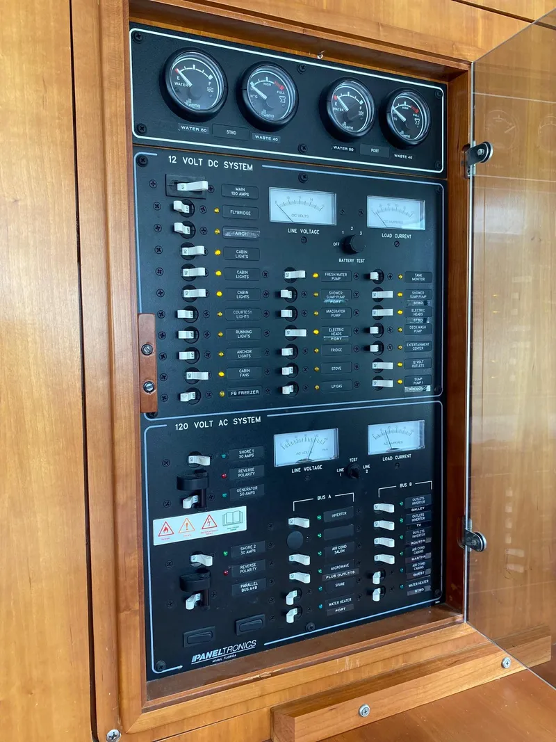 Slide: The Image of Control panel on a 2008 PDQ MV-41 boat with various switches and dials. - 15
