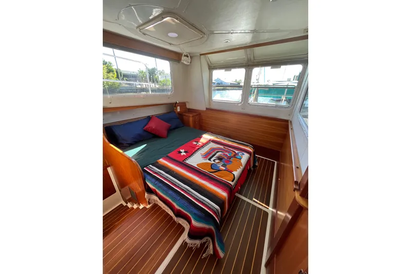 Slide: The Image of Compact bathroom in 2008 PDQ MV-41 boat with wooden cabinets and shower. - 29