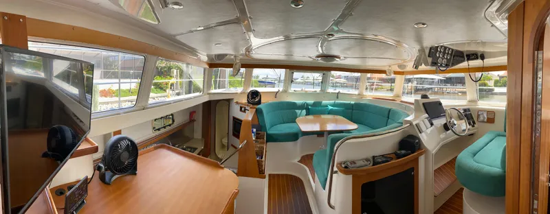 Slide: The Image of Spacious interior of 2008 PDQ MV-41 yacht with modern amenities and panoramic windows. - 4