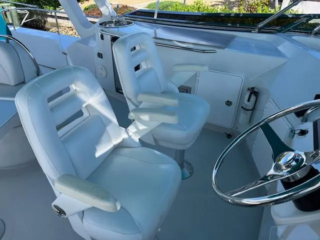 Slide: The Image of Remote control on a PDQ MV-41 boat table, 2008 model, with white seating. - 51