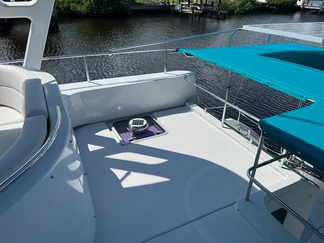 Slide: The Image of Luxury seating on a PDQ MV-41 yacht, 2008 model, docked by the water. - 52