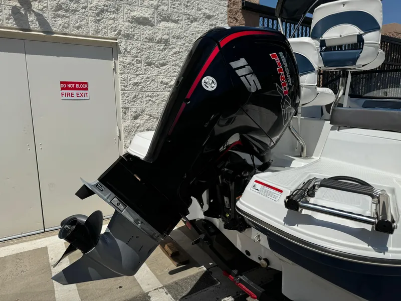Slide: The Image of 2021 Tracker Tahoe 450 TF boat with a Mercury 115 Pro XS outboard motor. - 8