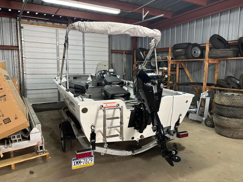 Slide: The Image of 2021 Crestliner 1650 Discovery SC boat in storage, rear view. - 6