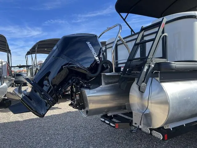 Slide: The Image of 2024 Godfrey Pontoons SW2486MT with Mercury outboard motor, rear view. - 12