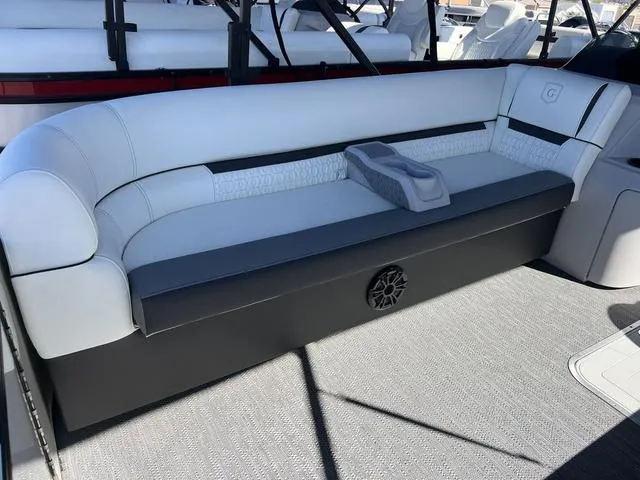 Slide: The Image of 2024 Godfrey Pontoons SW2486MT interior seating with cup holders. - 5