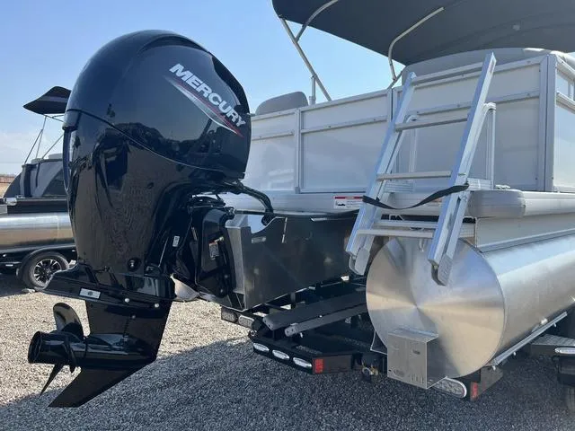 Slide: The Image of 2025 Godfrey Pontoons EX2286SBX with Mercury outboard motor and ladder. - 11