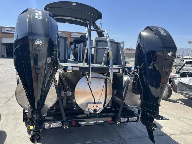 Slide: The Image of 2023 Godfrey Pontoons AquaPatio 256 SBW Twin with dual Mercury outboard engines. - 14