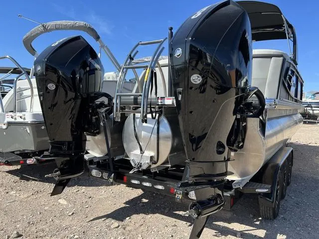 Slide: The Image of 2023 Godfrey Pontoons AquaPatio 256 SBW Twin with dual outboard motors. - 15