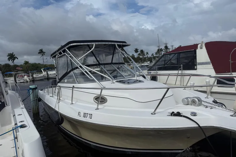 Slide: The Image of 2004 Pro-Line 30 Express Walkaround cabin interior with skylight and speakers. - 42