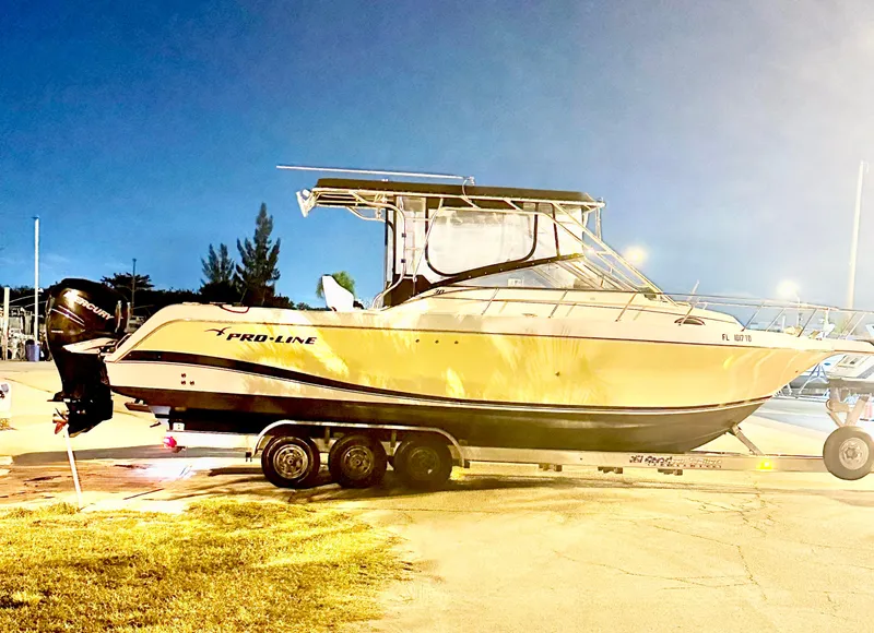 Slide: The Image of Close-up of the anchor on a 2004 Pro-Line 30 Express Walkaround boat. - 48