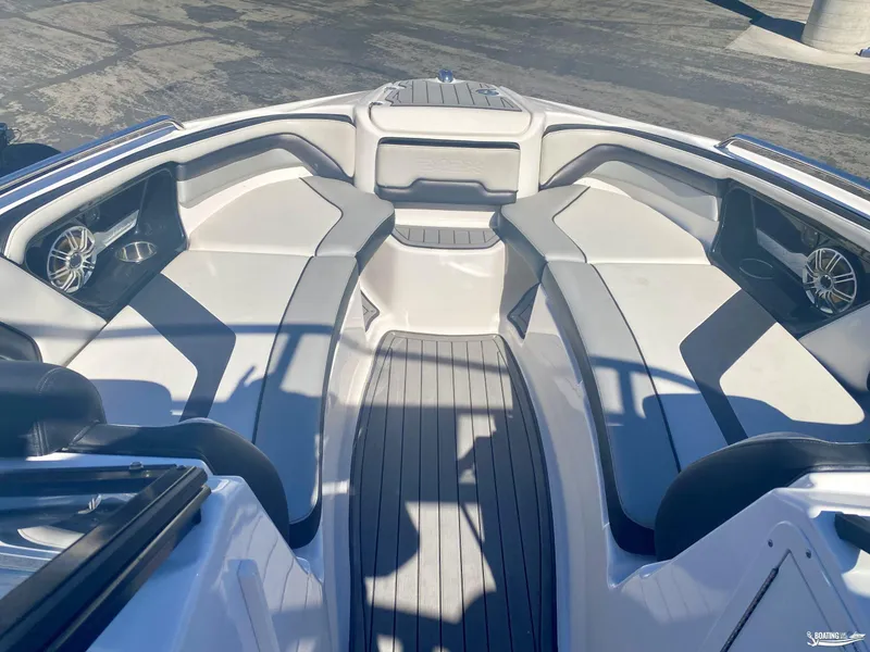 Slide: The Image of 2017 Yamaha Boats 242X interior seating area with speakers and cup holders. - 5