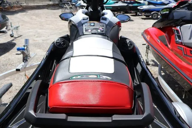 Slide: The Image of 2024 Yamaha Marine Waverunner GP HO, black and red seat, parked outdoors. - 4