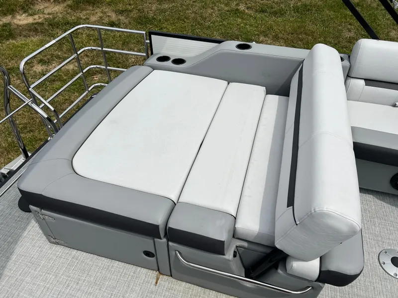 Slide: The Image of 2023 Godfrey SWEETWATER 2286 SFL boat with comfortable seating and cup holders. - 13