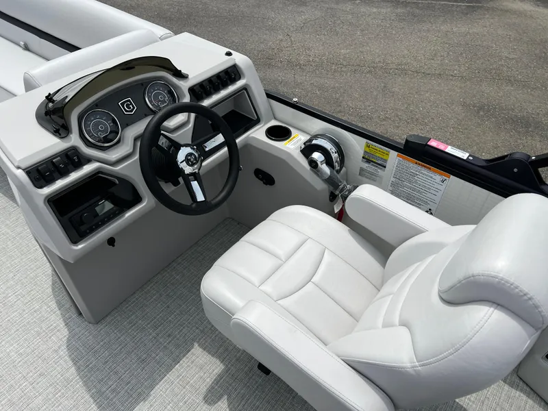 Slide: The Image of Captain's chair and helm of 2023 Godfrey SWEETWATER 2286 SFL pontoon boat. - 17