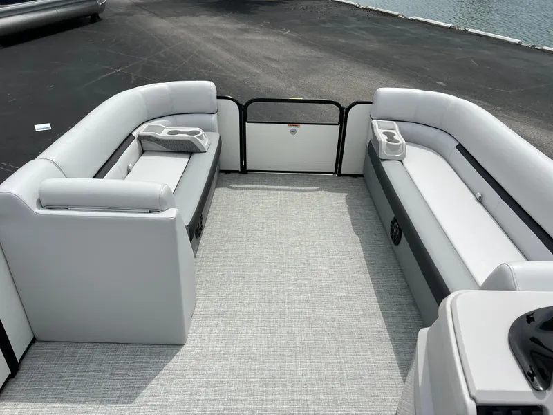 Slide: The Image of 2023 Godfrey SWEETWATER 2286 SFL pontoon boat interior with spacious seating. - 19