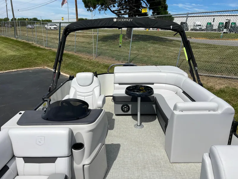 Slide: The Image of 2023 Godfrey Sweetwater 2486 C pontoon boat with spacious seating and modern design. - 11