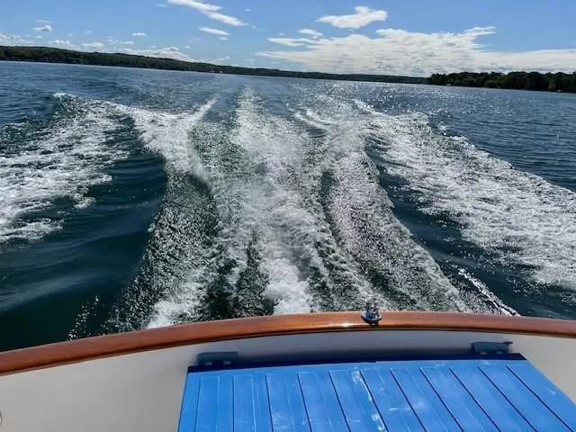 Slide: The Image of Wake of 2003 Legacy Yachts 34 Sedan on a sunny day at sea. - 21