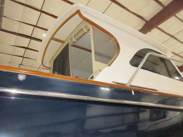 Slide: The Image of 2003 Legacy Yachts 34 Sedan in indoor storage. - 23