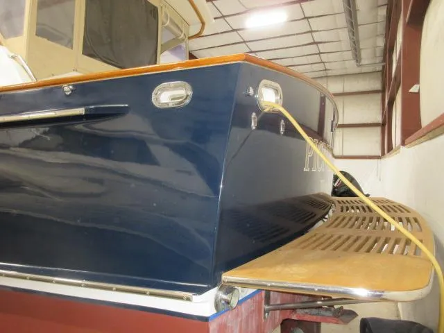 Slide: The Image of 2003 Legacy Yachts 34 Sedan in indoor storage. - 5